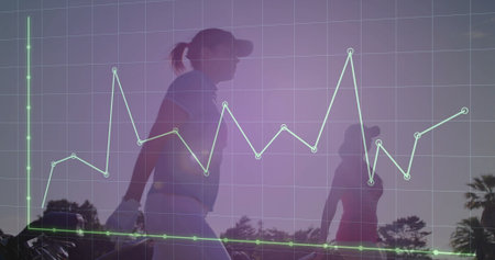 Two female golfers wearing polos and caps walking along golf fairway, with data grid overlay. Sportswear, athletic, teamwork, outdoor, fitness, competitive, leisureの写真素材
