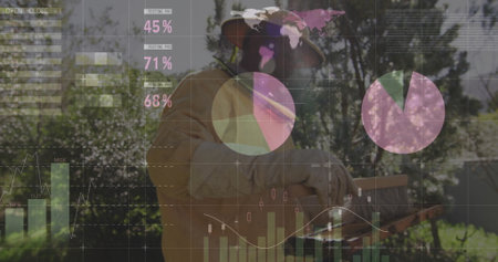Senior beekeeper in protective suit holding bee-covered honeycomb in apiary, with financial charts....