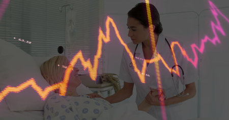 Holding patient's hand nurse in uniform speaking at hospital, with stethoscope. Healthcare,...