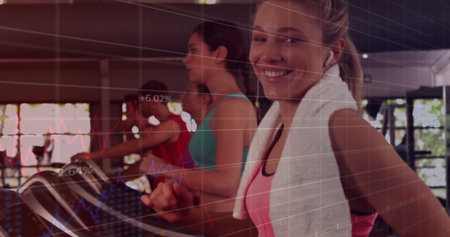 Running woman in pink top with earbuds on treadmill at gym with digital overlay, copy space....