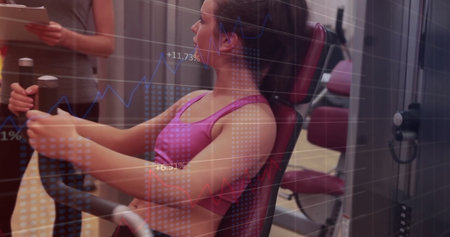 Client wearing pink bra pushing chest press in gym, instructor holding clipboard, data overlay....