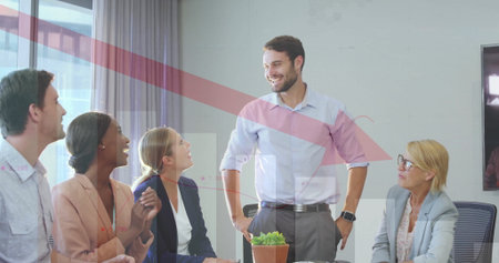Presenting man speaking and smiling in office meeting room, with succulent and monitor....
