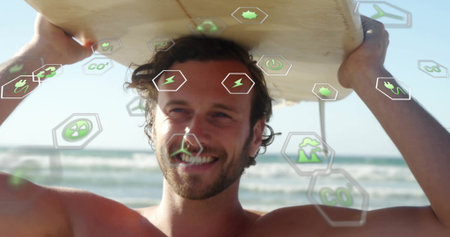 Holding surfer in swim trunks raising longboard overhead on beach, with floating energy icons....
