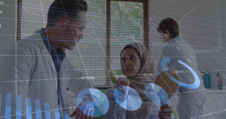 Consulting doctor talking with patient in clinic, with digital graphs. Medicine, healthcare,...
