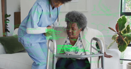 Assisting senior woman rising with walker in living room, nurse in scrubs wearing stethoscope....