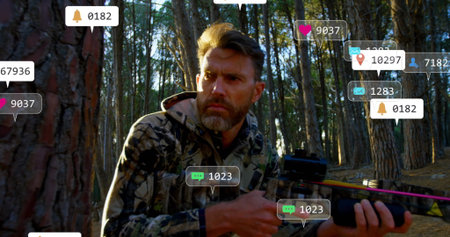 Crouching hunter wearing camo jacket holding crossbow in pine forest, with floating notifications....
