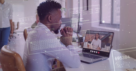 Joining African American man using laptop for online call at tech office desks, with data overlays....