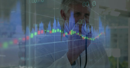 Doctor in lab coat holding stethoscope examining charts on digital display in clinic. Medical,...