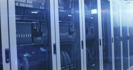 Glowing server rack row showcasing network switches, cables in data center, with LED status lights....