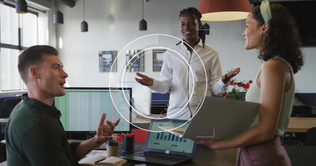 Three coworkers in formal wear discussing insights at desk in office, with laptop monitors. Collaboration, teamwork, brainstorming, innovation, professional, productivity, modernの写真素材