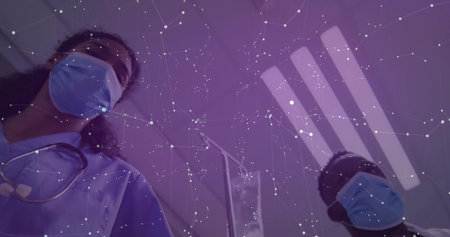 Staff in scrubs standing by IV drip in hospital ward with masks stethoscopes lights network overlay. Healthcare, collaboration, innovation, technology, medical, professionalism, clinicalの写真素材