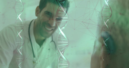 Leaning doctor in white coat with stethoscope discussing DNA graphics with patient in exam room. Healthcare, diagnostics, professionalism, innovation, patientcare, technology, medicineの写真素材