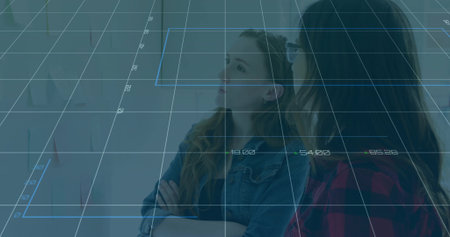 Discussing two colleagues analyzing charts and notes in office planning area, with translucent grid. Collaboration, teamwork, brainstorming, innovation, data visualization, modern, professionalの写真素材