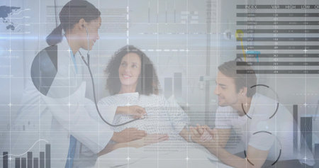 Examining doctor using stethoscope on pregnant patient in exam room, with overlaid digital graphics. Medical, healthcare, diagnosis, support, maternity, digital, clinicalの写真素材
