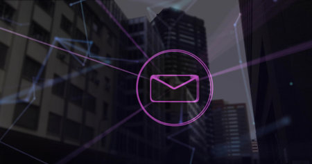Pulsing neon purple envelope icon glowing over urban skyline at evening, with glowing network lines. Futuristic, cyber, digital, connectivity, technology, metropolis, innovationの写真素材