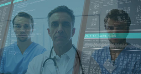 Standing white coat doctor and scrubbed colleagues studying digital encryption overlay in clinic. Medical, cybersecurity, technology, innovation, healthcare, digital, dataの写真素材