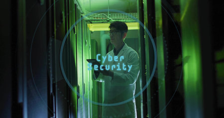 Man wearing labcoat with digital tablet scanning racks in datacenter, with cybersecurity overlay....