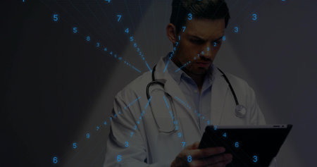 Analyzing doctor in white lab coat with stethoscope using tablet in clinic, with digital overlay....
