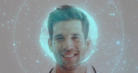 Smiling doctor wearing white coat, stethoscope in studio, displaying globe grid with particles. Health, medical technology, innovation, healthcare, digital, futurism, professionalismの写真素材