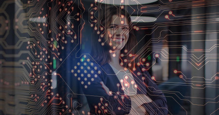 Posing businesswoman wearing dark blazer over blouse at office hallway, with circuit board overlay....