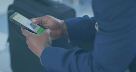 Animation of network of connections with media icons over caucasian woman using tabletの写真素材