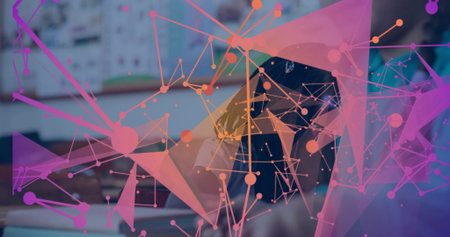 Typing student wearing long sleeves using laptop in classroom, with network visualization overlay. Technology, connectivity, digital, innovation, knowledge, communication, modernの写真素材