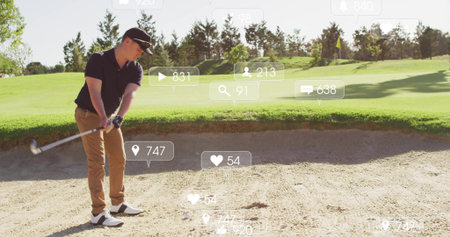 Holding club, golfer in golf attire preparing strike in sand bunker displaying social media overlay. Sports, leisure, outdoor, competition, elegance, recreation, activityの写真素材