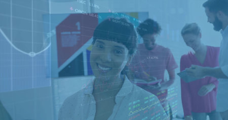 Presenting female analyst displaying financial charts in office, with colleagues using tablets. Business, teamwork, innovation, data, strategy, analysis, modernityの写真素材