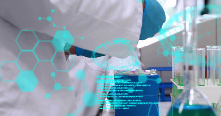 Animation of snow falling at christmas over aurora and fir treesの写真素材