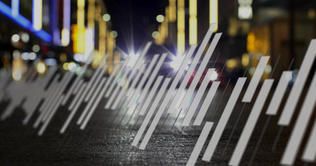 Overlaying white bar graphics on wet urban street at night, with blurred headlights, neon signs. Urban, nightlife, abstract, modern, futuristic, dynamic, vibrantの写真素材