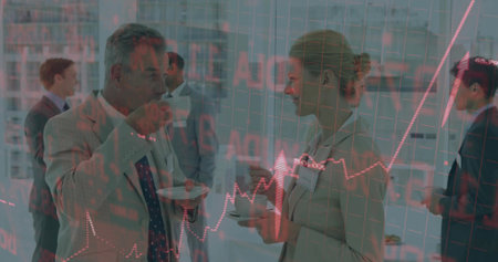 Holding coffee cups, mature professionals conversing in high-rise event space, with stock overlay. Corporate, networking, business, finance, modern, skyline, professionalの写真素材