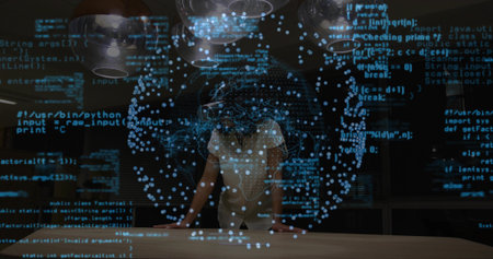 Woman wearing blouse and pants manipulating holographic data sphere above table in lab, with code. Futuristic, innovation, technology, visualization, analytical, sleek, immersiveの写真素材