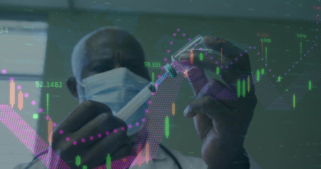 Scientist holding pipette and vial wearing labcoat and surgical mask in lab. Researcher, laboratory, analytical, scientific, data visualization, healthcare, technologyの写真素材