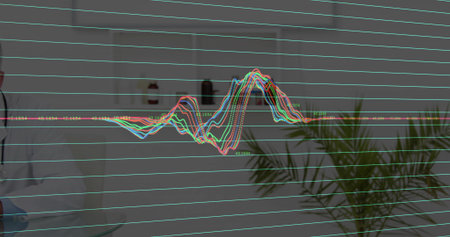 Reviewing medical waveform man wearing white coat in medical office, with stethoscope, copy space. Healthcare, analysis, technology, professionalism, diagnostics, clinical, innovationの写真素材