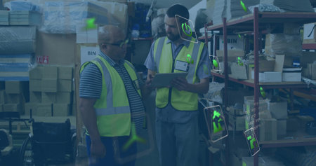 Two warehouse workers wearing high-visibility vests reviewing stock in warehouse, with clipboard....