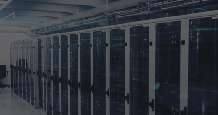 Running metal server cabinets holding servers, switches and cable trays in data center. Technology,...