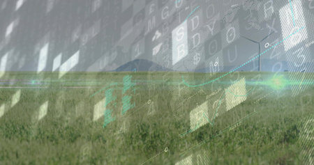 Displaying grassy field on farmland showing floating data streams, with distant wind turbines....
