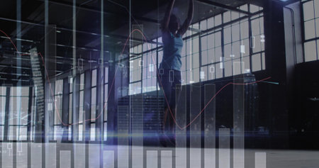 Jumping athletic woman wearing workout clothes using jump rope in gym studio, with data overlays....
