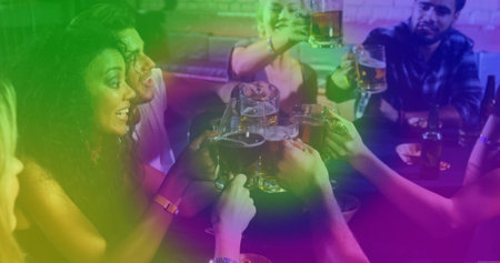 Clinking group of friends raising glass beer mugs in cozy pub, with snack plates and coasters. Celebration, camaraderie, nightlife, socializing, warmth, rustic, leisureの写真素材