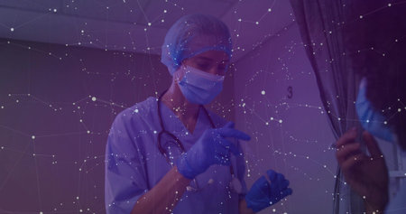 Gesturing masked nurse in scrubs conducting consultation in area 3, with stethoscope and curtain. Medical, healthcare, professional, clinical, diagnostic, hospital, caregivingの写真素材