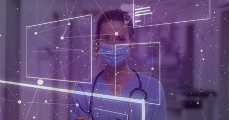Standing medical worker in scrubs and mask in hospital corridor, with stethoscope, digital overlay....