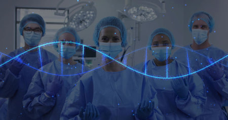 Standing five surgeons wearing surgical attire in operating room, with DNA double-helix overlay. Medical, teamwork, technology, healthcare, innovation, precision, clinicalの写真素材