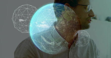 Man wearing gray shirt and glasses using digital globe and data spheres in office, copy space. Technology, data visualization, futuristic, innovation, professional, digital interface, modern workspaceの写真素材