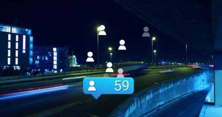Blue notification bubble showing 59 floating over city road at night, with avatars and light trails. Urban, motion, nightscape, illumination, technology, connectivity, infrastructureの写真素材