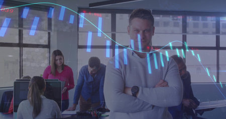 Leading mid adult white man crossing arms wearing grey sweater guiding team at office, with tablet. Team, collaboration, professionalism, urban, modern, productivity, leadershipの写真素材