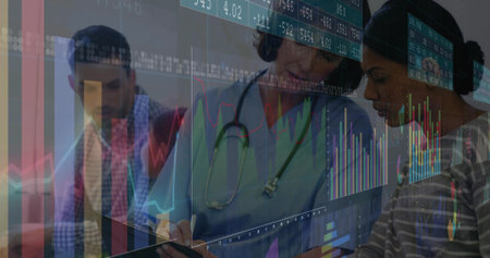 Writing mature doctor consulting patients in clinic, with stethoscope clipboard and digital charts....