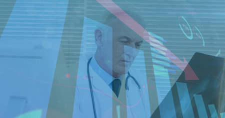 Standing senior male doctor examining digital chart projections in medical office, with stethoscope. Medical, healthcare, analytics, technology, professionalism, modern, dataの写真素材