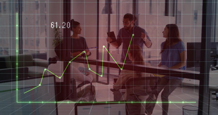 Pointing analyst and team discussing line chart around conference table in office, with laptops. Collaboration, teamwork, business, modernoffice, startup, brainstorming, productivityの写真素材