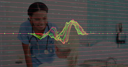 Leaning nurse wearing light blue scrubs explaining vital sign graph at clinic desk with stethoscope....