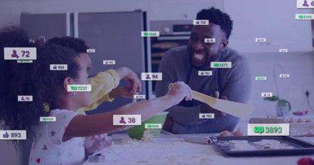Smiling father and children kneading dough on kitchen counter, with mixing bowl and social overlays. Family, culinary, modern, interactive, playful, domestic, creativeの写真素材